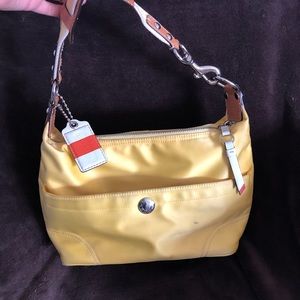 COACH yellow satin handbag